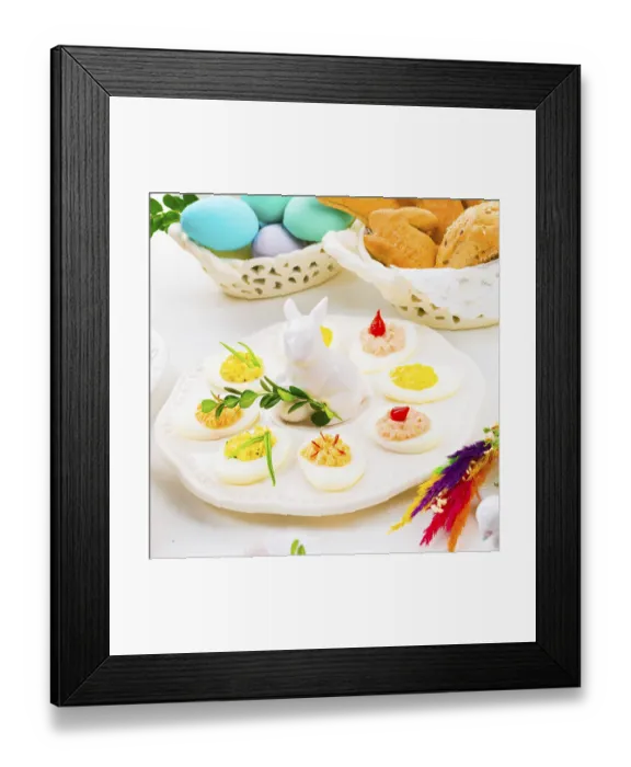 Framed Print : A colourful and festive Easter table decoration Framed Print : A colourful and festive Easter table decoration