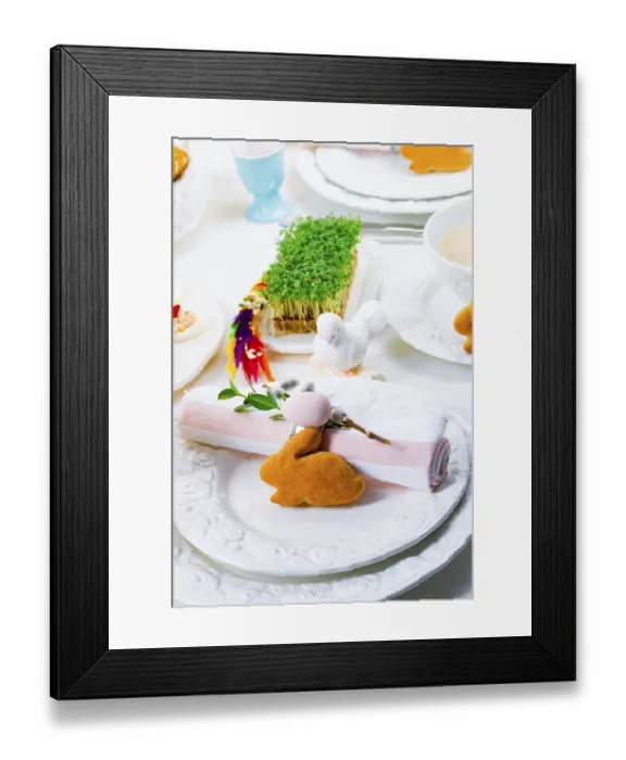 Framed Print : A colourful and festive Easter table decoration