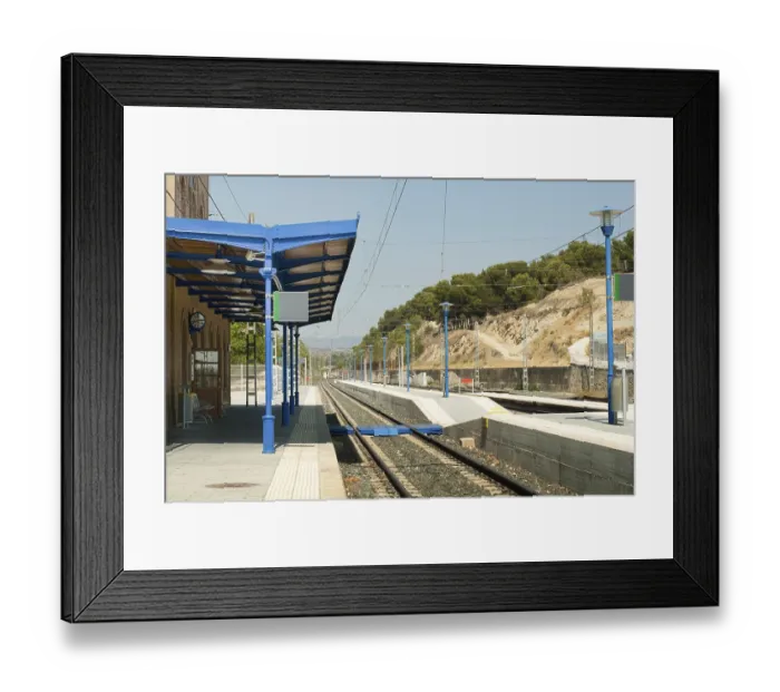Framed Print : Ancient-style railway station and railroad rails