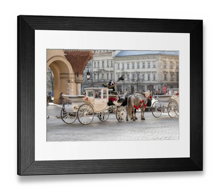 Framed Print : Horses with a carriage on the main square of Krakow in Poland Framed Print : Horses with a carriage on the main square of Krakow in Poland