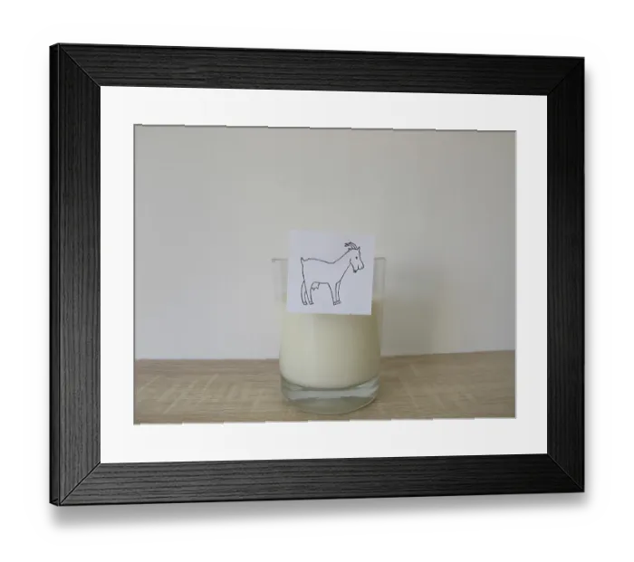 Framed Print : A glass of fresh goat's milk A glass of fresh goat's milk