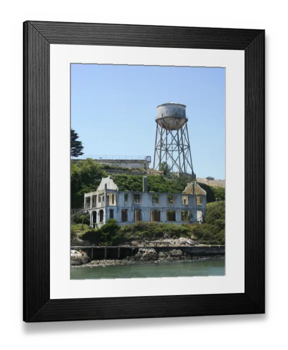 Framed Print : The ruins of the officers club with the water tower in the background on Alcatraz Island