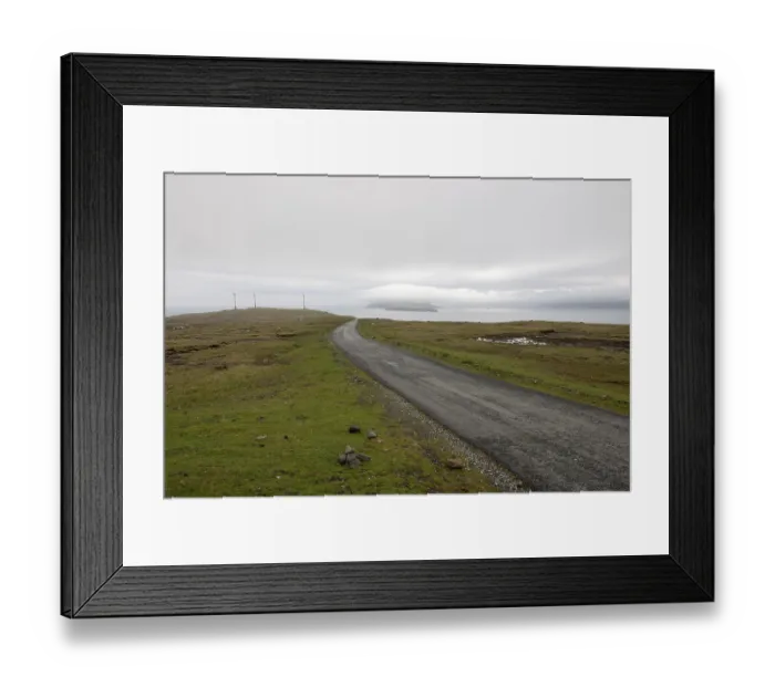 Framed Print : Street on the Faroe Islands in the south of Eysturoy with wind mills and nolsoy