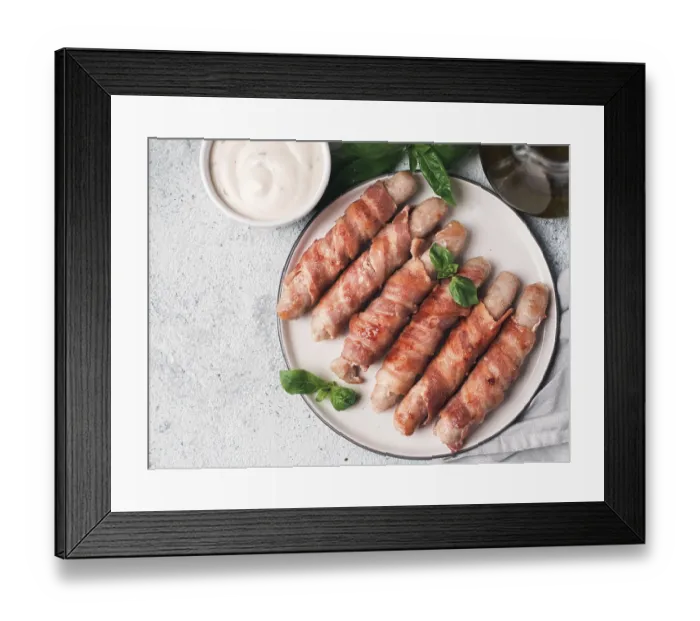 Framed Print : Ready-to-eat pigs sausages wrapped in bacon on plate Framed Print : Ready-to-eat pigs sausages wrapped in bacon on plate