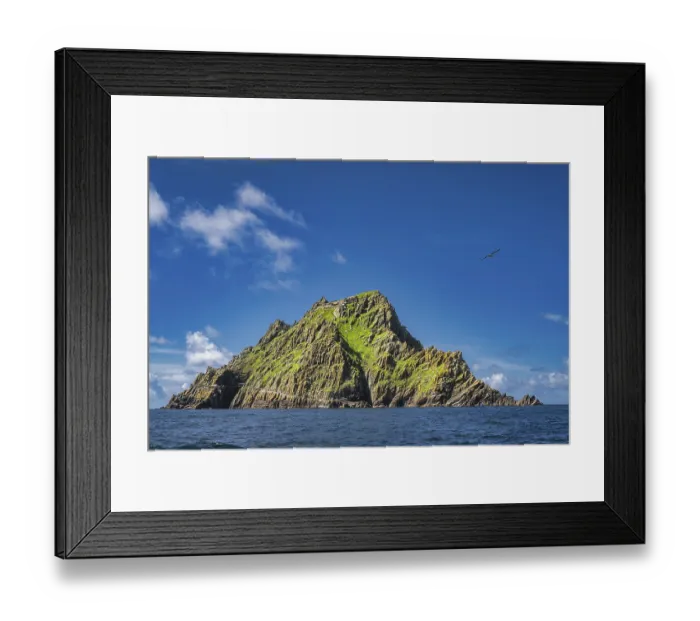 Framed Print : Tour boats docking to Skellig Michael island with monks hermitage on top Framed Print : Tour boats docking to Skellig Michael island with monks hermitage on top