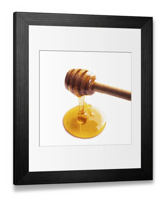 Framed Print : Honey drip isolated on white background