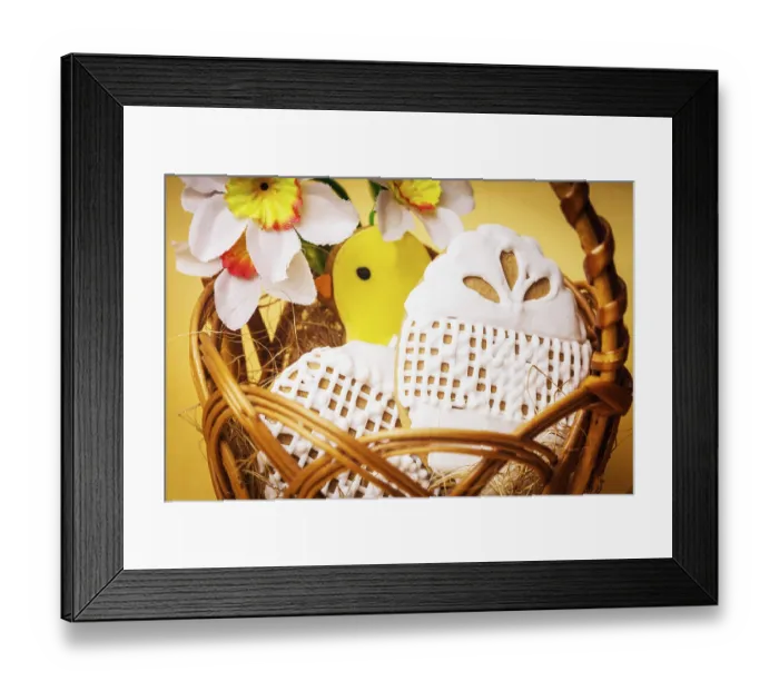 Framed Print : Easter cookies in basket over yellow background