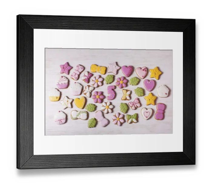Framed Print : Homemade gingerbreads of various shapes laid out on the table