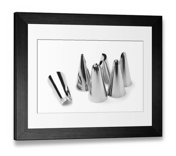 Framed Print : Spouts for icing syringe on white background