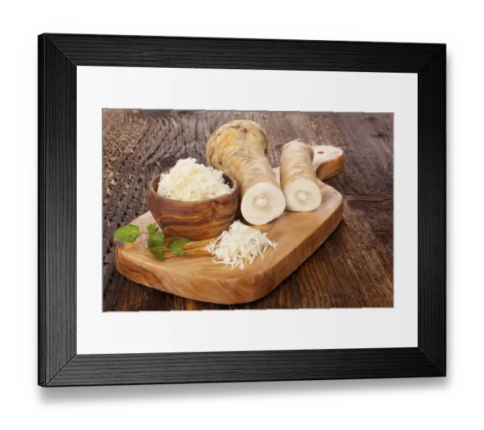 Framed Print : Fresh and grated horseradish in wooden bowl with parsley on wooden cutting board Framed Print : Fresh and grated horseradish in wooden bowl with parsley on wooden cutting board