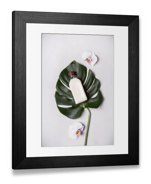Framed Print : Coconut oil and tropical leaves and flowers
