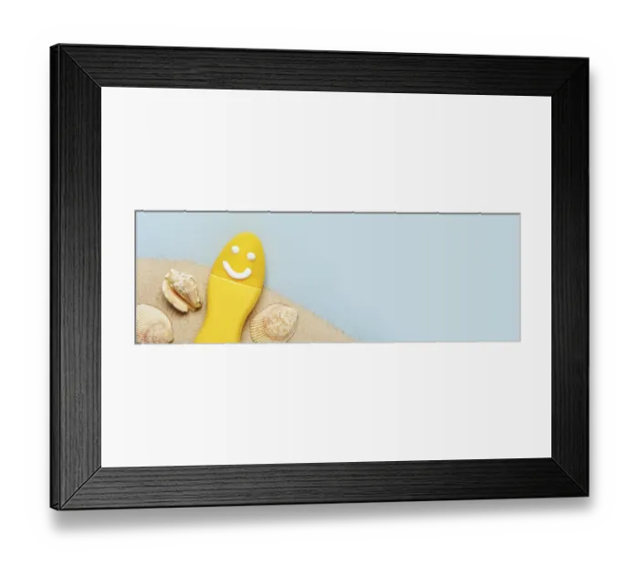 Framed Print : Yellow tube with happy sunscreen face
