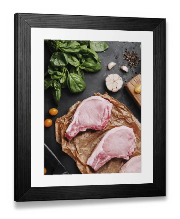 Framed Print : food still-life, Several raw pork steaks on baking paper