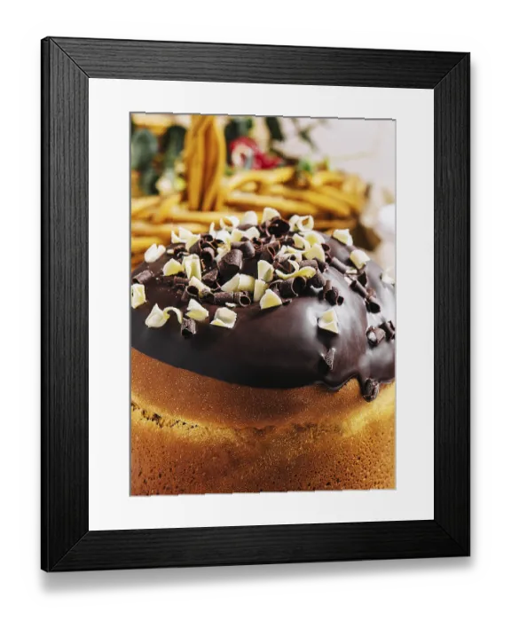 Framed Print : food still-life, Round fragrant Easter bun with chocolate sprinkles