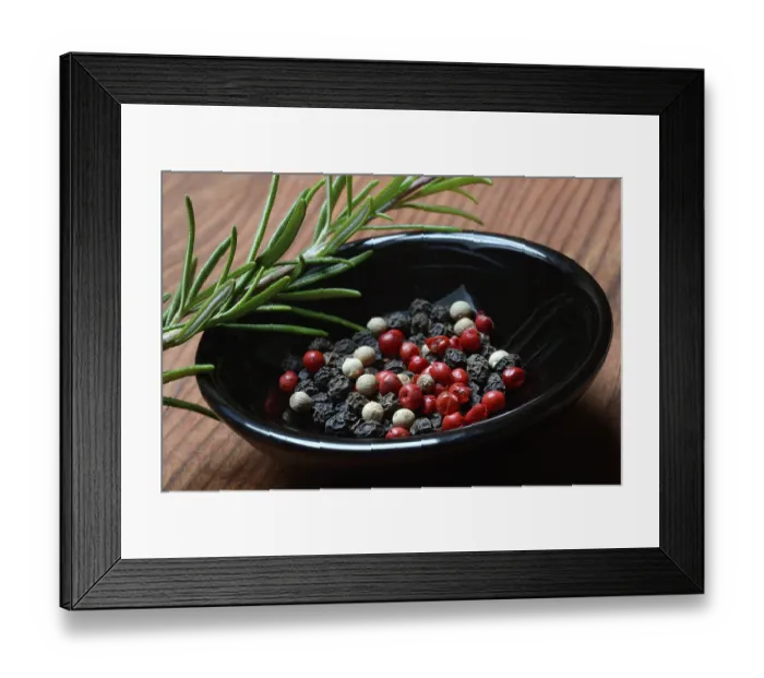 Framed Print : Black and white peppercorns in shell