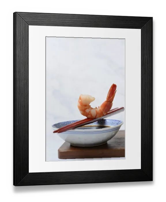 Framed Print : Cooked shrimp on chopsticks and shell with soy sauce