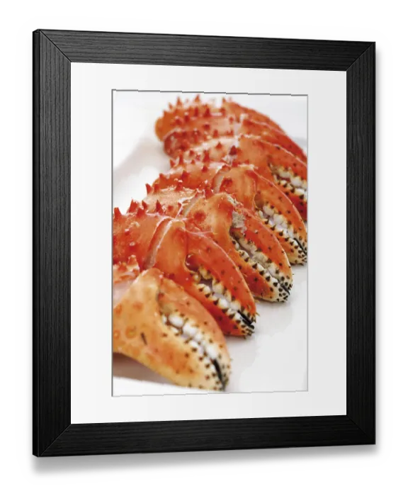 Framed Print : Crab pincers on a plate