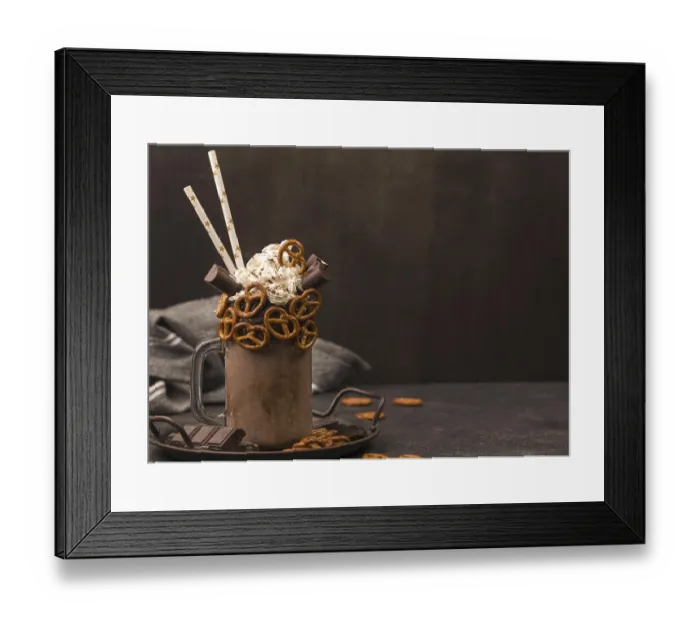 Framed Print : Front view chocolate milkshake with straws pretzels
