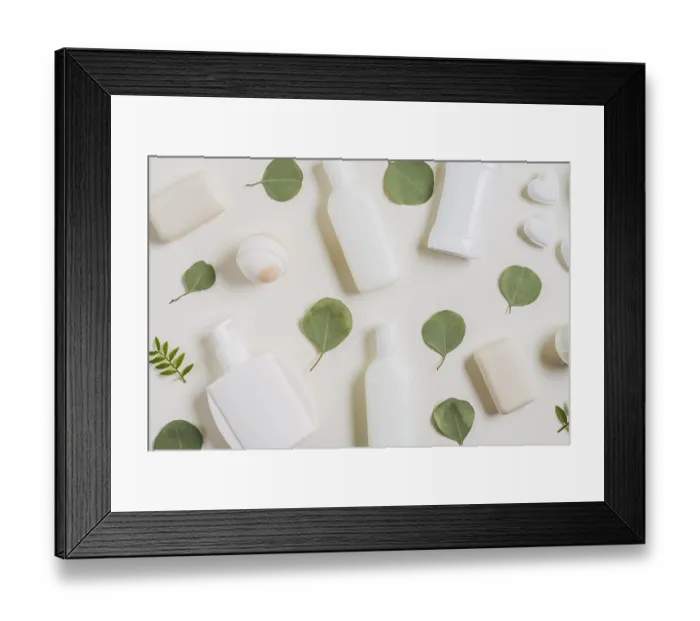 Framed Print : Overhead view cosmetics products soap bath bomb green leaves