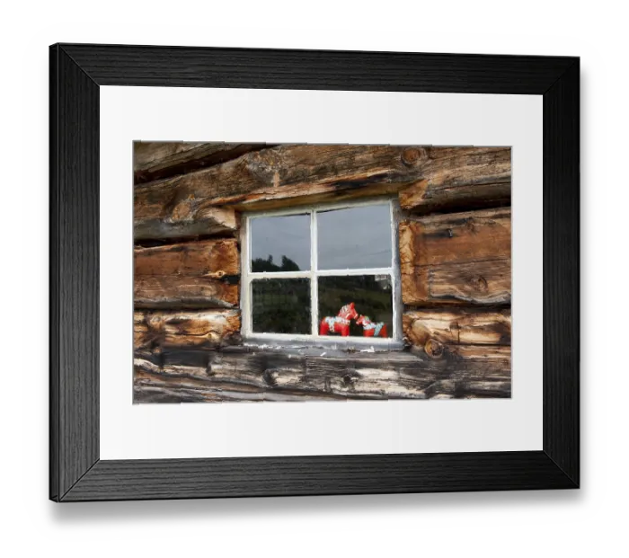 Framed Print : Red Dalarna horses displayed in a window