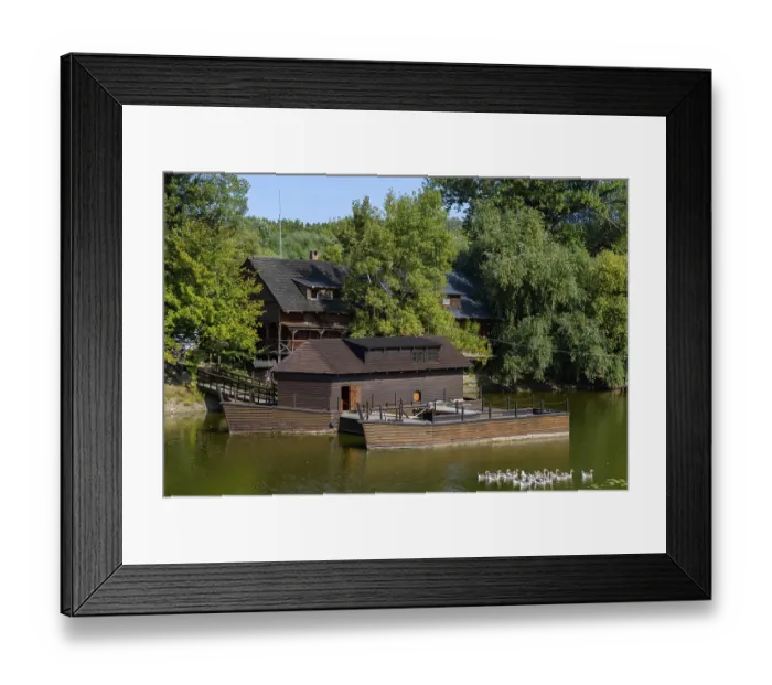 Framed Print : Museum of the watermill, surrounded by trees with geese in front of it Framed Print : Museum of the watermill, surrounded by trees with geese in front of it