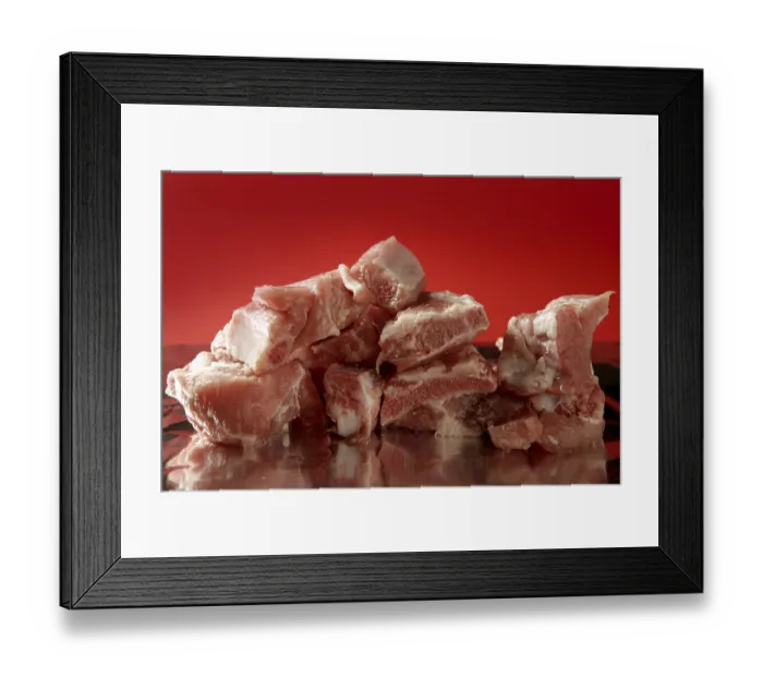 Framed Print : Pig, pork raw meat pieces over red background