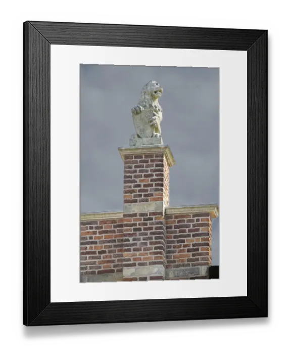 Framed Print : Stone lion on medieval gable and house roof in the netherlands Framed Print : Stone lion on medieval gable and house roof in the netherlands