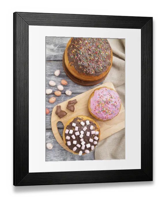 Framed Print : Homemade glazed and decorated easter pies with chocolate eggs and rabbits on a gray wooden background and linen textile Framed Print : Homemade glazed and decorated easter pies with chocolate eggs and rabbits on a gray wooden background and linen textile