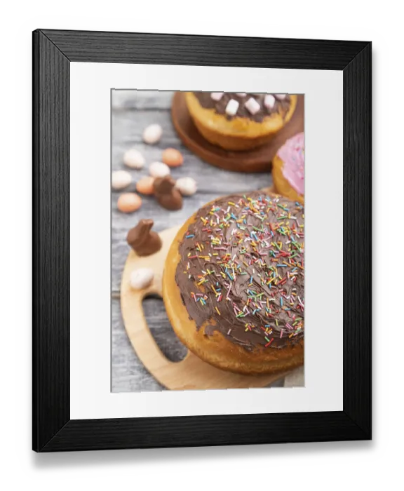 Framed Print : Homemade glazed and decorated easter pies with chocolate eggs and rabbits on a gray wooden background and linen textile Framed Print : Homemade glazed and decorated easter pies with chocolate eggs and rabbits on a gray wooden background and linen textile