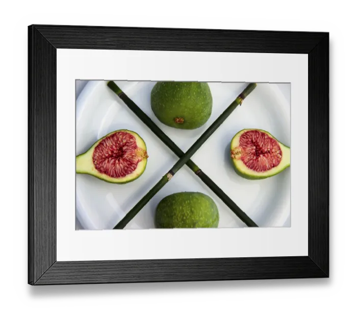 Framed Print : Fresh green figs with blades of horse tail on a plate