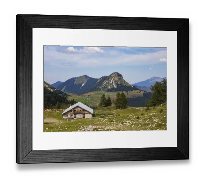 Framed Print : Alpine meadow with cows and alpine hut on the Trattbergalm with Gennerhorn
