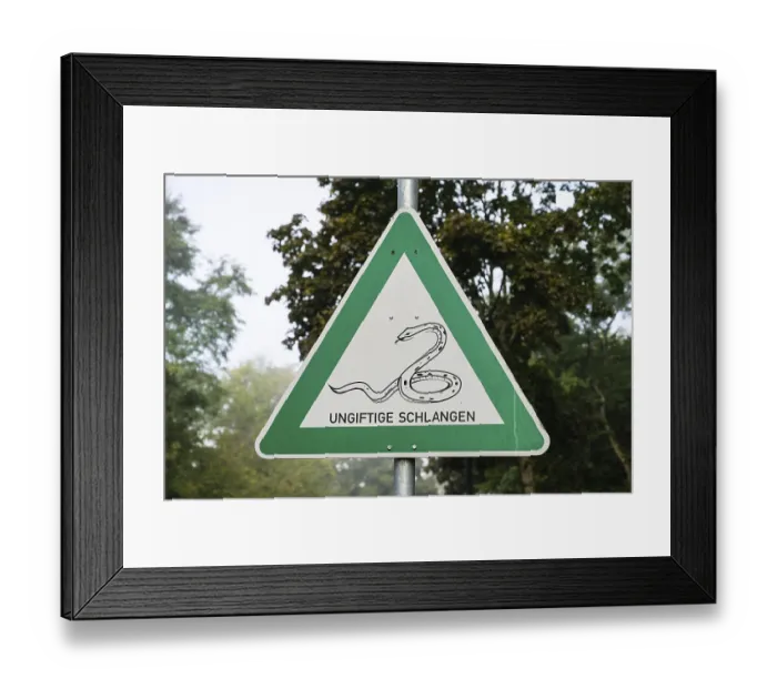 Framed Print : Warning sign, non-poisonous snakes Framed Print : Warning sign, non-poisonous snakes