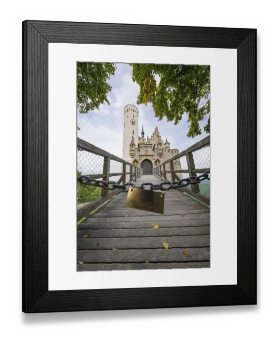 Framed Print : A bridge leads to a majestic Gothic-style castle surrounded by autumnal trees Framed Print : A bridge leads to a majestic Gothic-style castle surrounded by autumnal trees