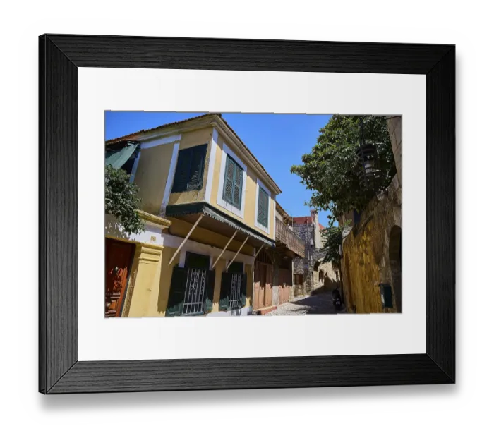 Framed Print : Colourful house facades with shutters in a historic alley Framed Print : Colourful house facades with shutters in a historic alley