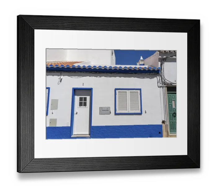 Framed Print : Facade of buildings in Tavira, old town