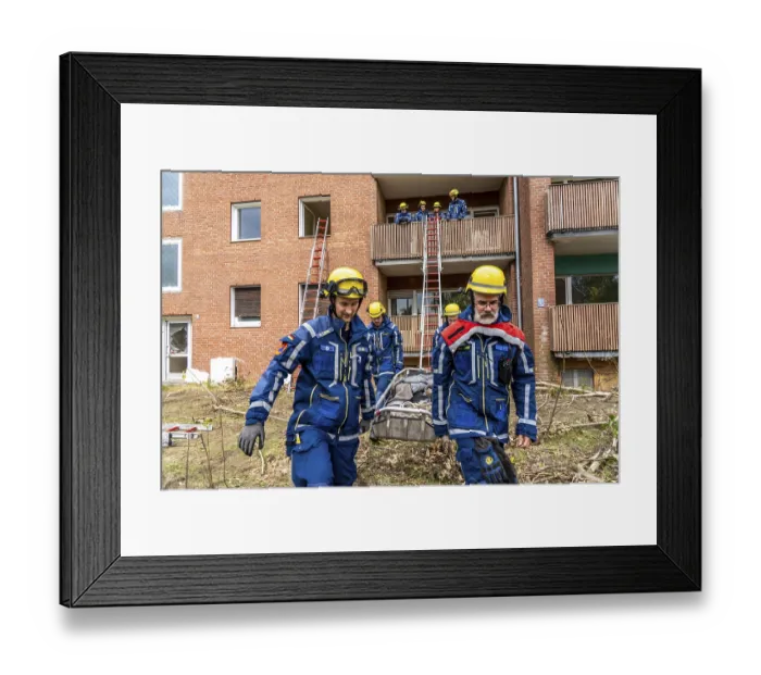 Framed Print : Rescue and recovery of people after a drone attack on residential buildings in a civil defence scenario