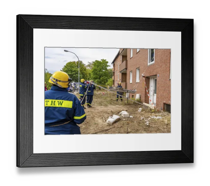 Framed Print : Rescue and recovery of people after a drone attack on residential buildings in a civil defence scenario Framed Print : Rescue and recovery of people after a drone attack on residential buildings in a civil defence scenario