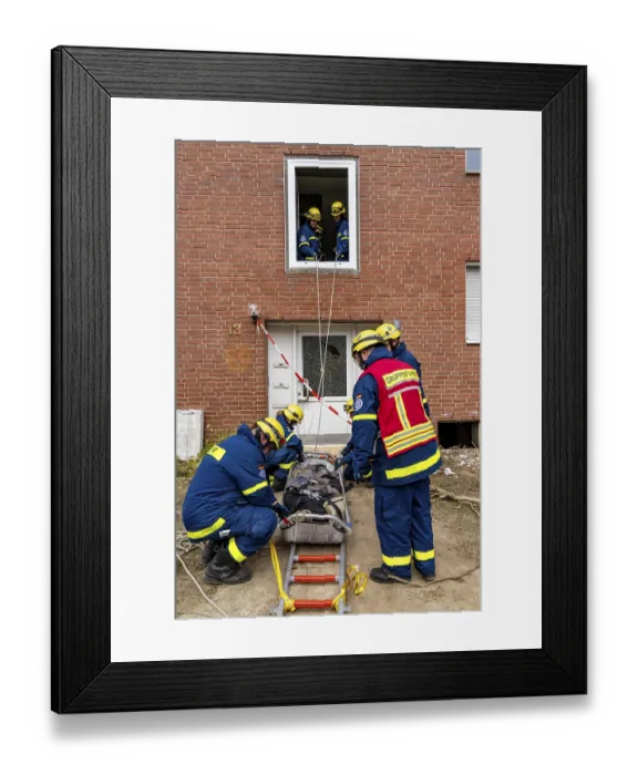 Framed Print : Rescue and recovery of people after a drone attack on residential buildings in a civil defence scenario