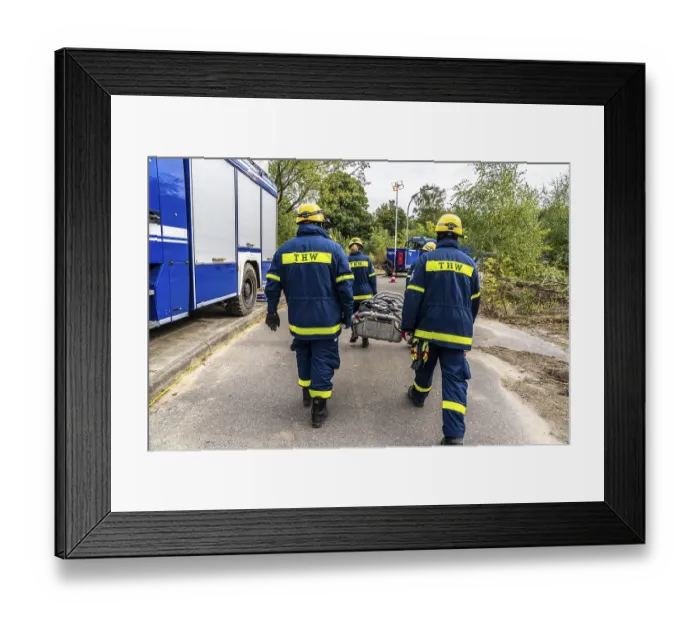 Framed Print : Rescue and recovery of people after a drone attack on residential buildings in a civil defence scenario