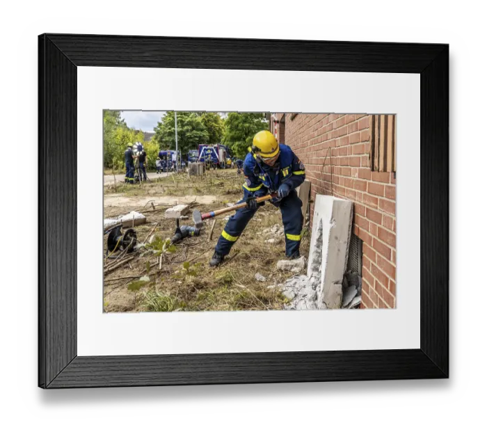 Framed Print : Rescue and recovery of people after a drone attack on residential buildings in a civil defence scenario Framed Print : Rescue and recovery of people after a drone attack on residential buildings in a civil defence scenario
