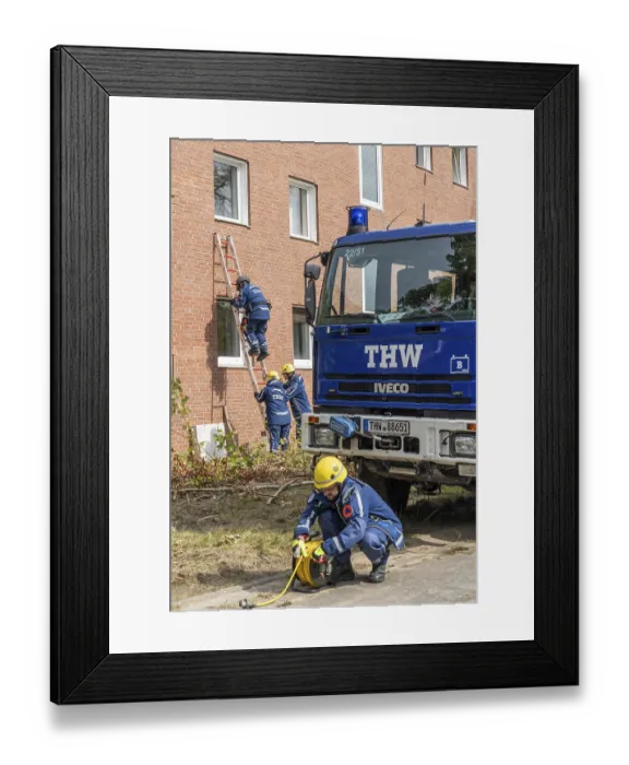 Framed Print : Rescue and recovery of people after a drone attack on residential buildings in a civil defence scenario