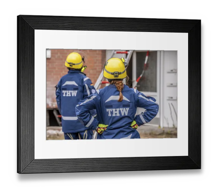 Framed Print : Rescue and recovery of people after a drone attack on residential buildings in a civil defence scenario