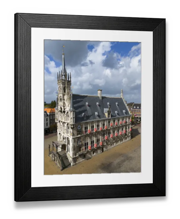 Framed Print : Gothic town hall in a city centre with characteristic architecture and cloudy sky
