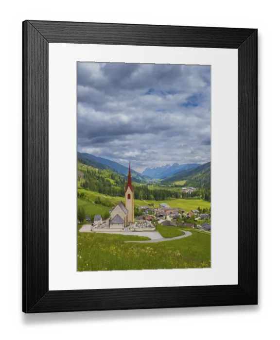 Framed Print : View of the church of Winnebach with the valley behind it