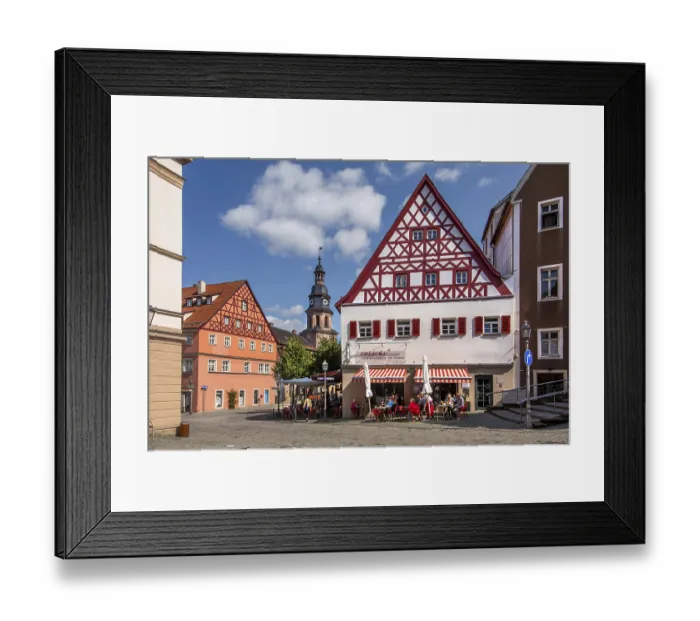 Framed Print : Half-timbered houses with street cafe and hospital church in the old town