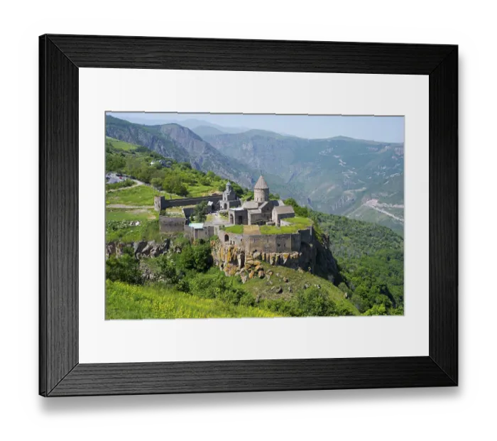 Framed Print : An ancient monastery sits majestically on a hill overlooking a mountainous landscape Framed Print : An ancient monastery sits majestically on a hill overlooking a mountainous landscape