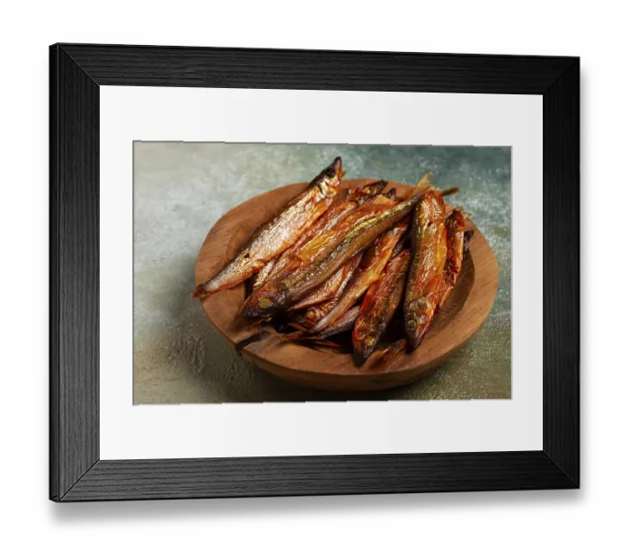 Framed Print : Cold smoked capelin, on a wooden bowl