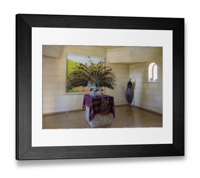Framed Print : Interior view with peacock sculpture and colourful cloth on table Framed Print : Interior view with peacock sculpture and colourful cloth on table