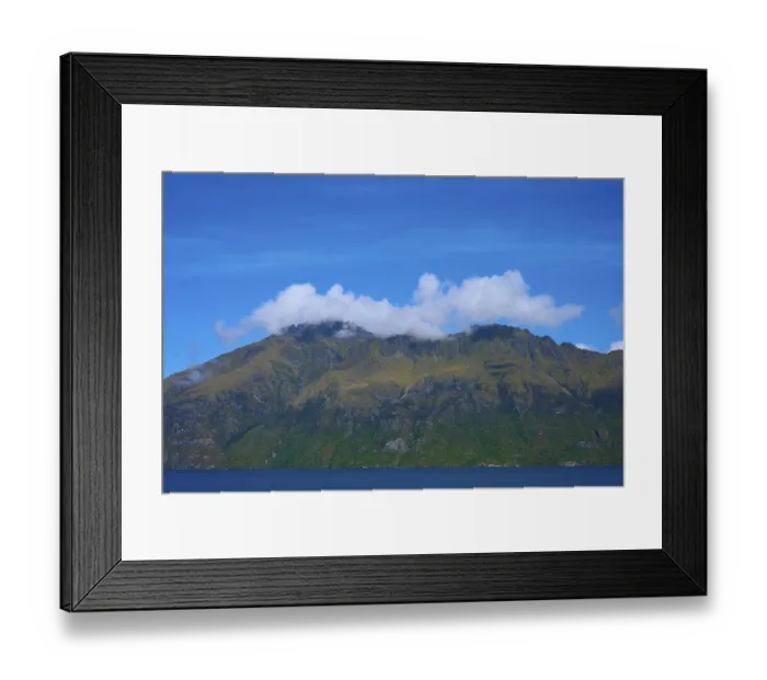 Framed Print : Majestic mountains with clouds against a clear blue sky Framed Print : Majestic mountains with clouds against a clear blue sky