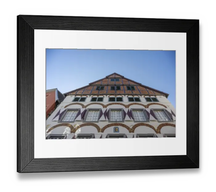 Framed Print : Half-timbered house with striking gables and windows
